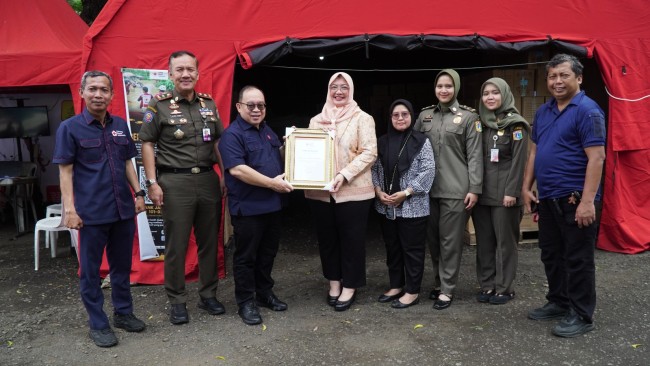 Peduli Sumatera, DWP Satpol PP Salurkan Donasi Bencana Banjir Bandang Melalui PMI